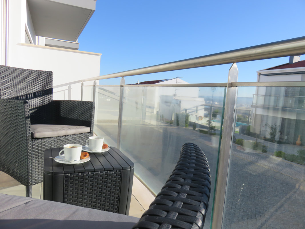 Terras met uitzicht bij Casa Elegante
